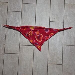 Doggydana featuring Red, Orange, Purple, and White Hearts on a Red Background